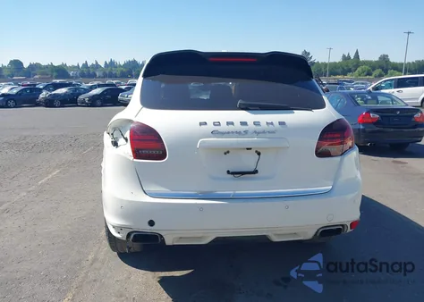 2012 Porsche Cayenne S Hybrid z USA, uszkodzony, nr VIN WP1AE2A25CLA90443